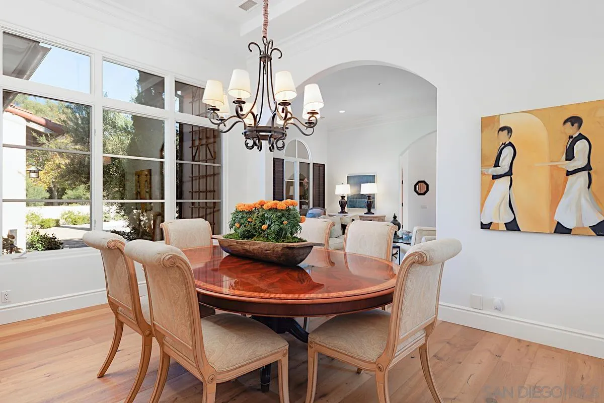 13657 Paseo De La Huerta Poway, CA 92064 - Photo 7 of 38 a view of a dining room with furniture window and outside view