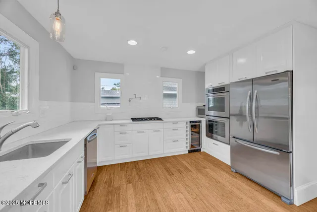 a bedroom with a bed and chair