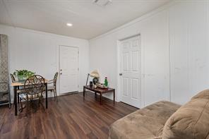 1713 Sycamore Street Commerce, TX 75428 - Photo 6 of 22 a living room with furniture and wooden floor