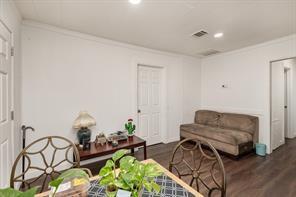 1713 Sycamore Street Commerce, TX 75428 - Photo 7 of 22 a living room with furniture and a couch