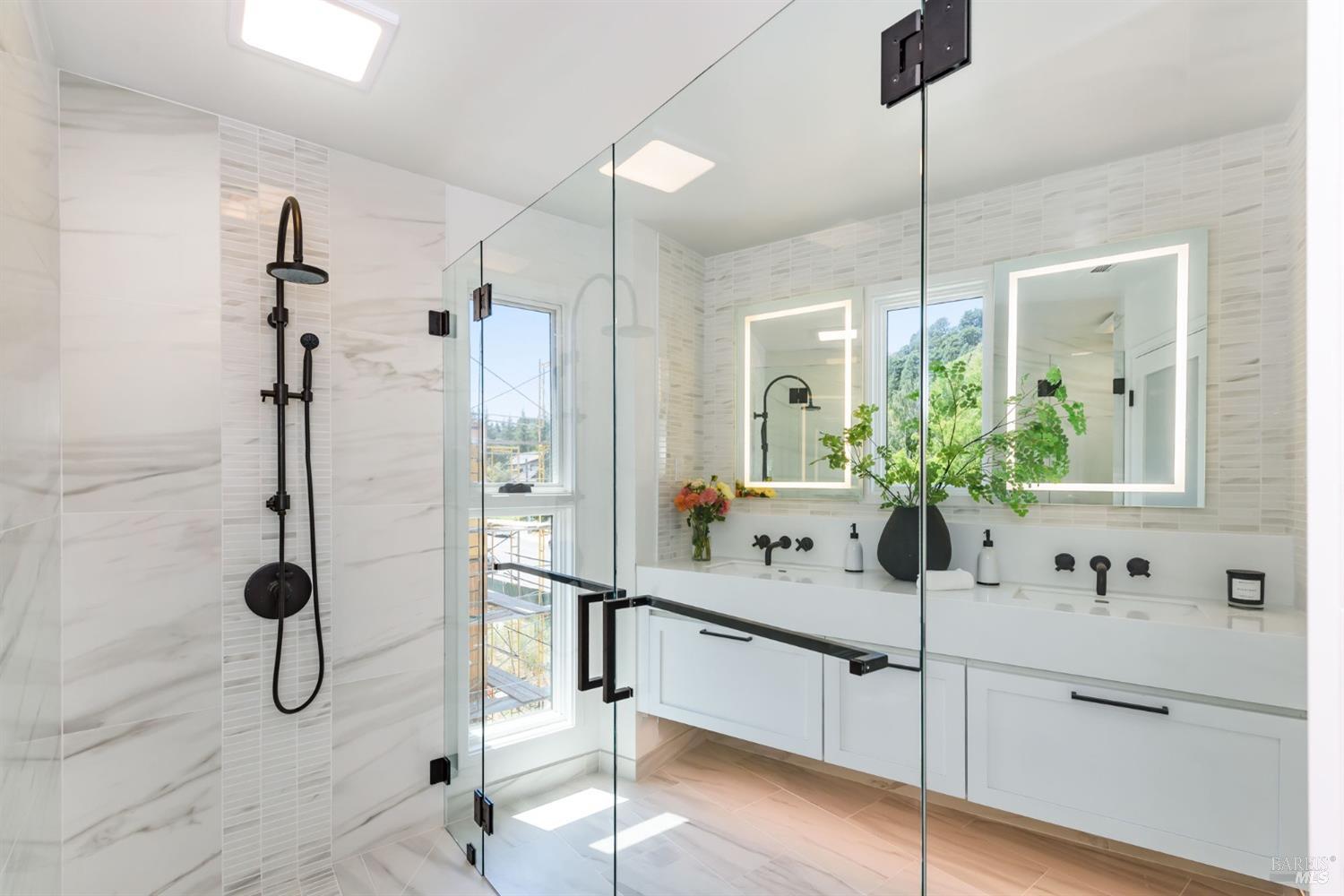 1068 Foster Road Napa, CA 94558 - Photo 14 of 18 a bathroom with a double vanity sink mirror and shower