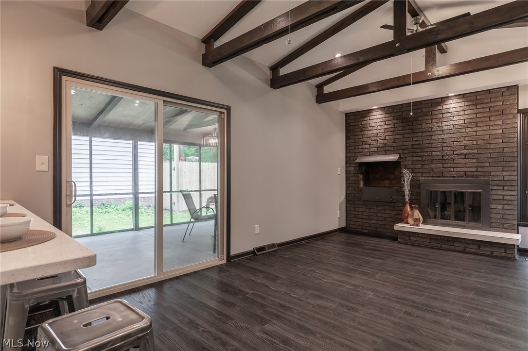 3674 Stoneleigh Road Cleveland, OH 44121 - Photo 12 of 35 The Family room has custom built ceiling trusses and a sliding door that leads to the screened in Porch