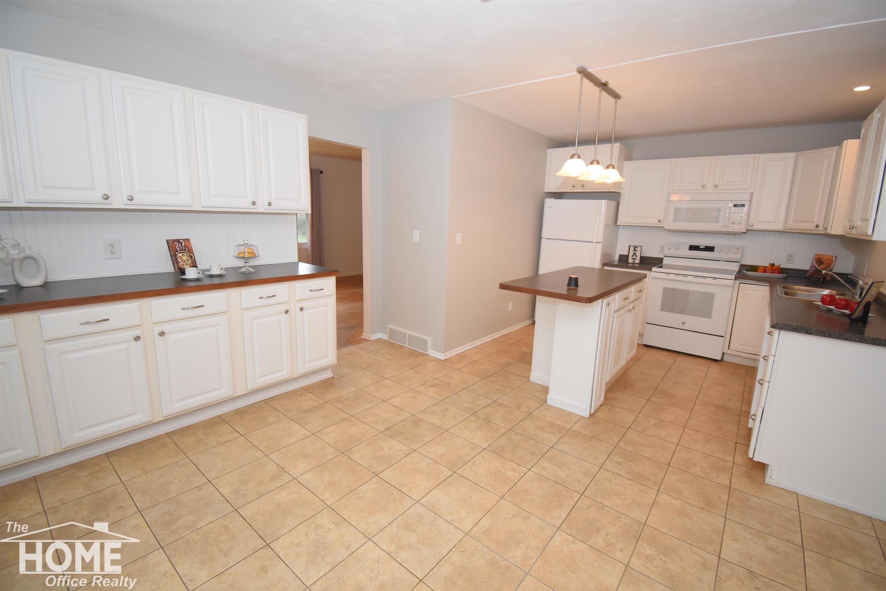 990 North Hintz Road Owosso, MI 48867 - Photo 7 of 26 50160309-2940bdc9-9980-4819-996b-8c032112ee8c.JPG