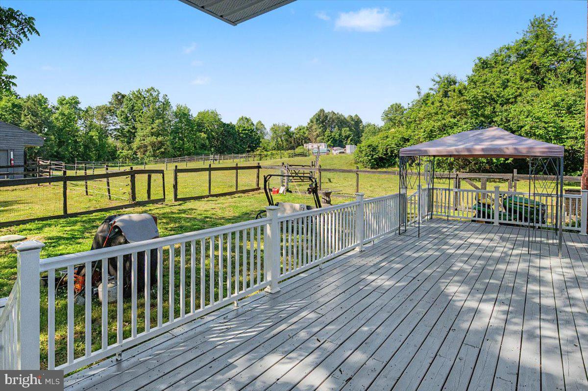 1010 Red Lion Road New Castle, DE 19720 - Photo 6 of 45 a view of a wooden deck with a yard
