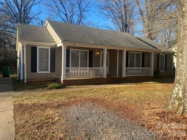 a house with yard in front of it