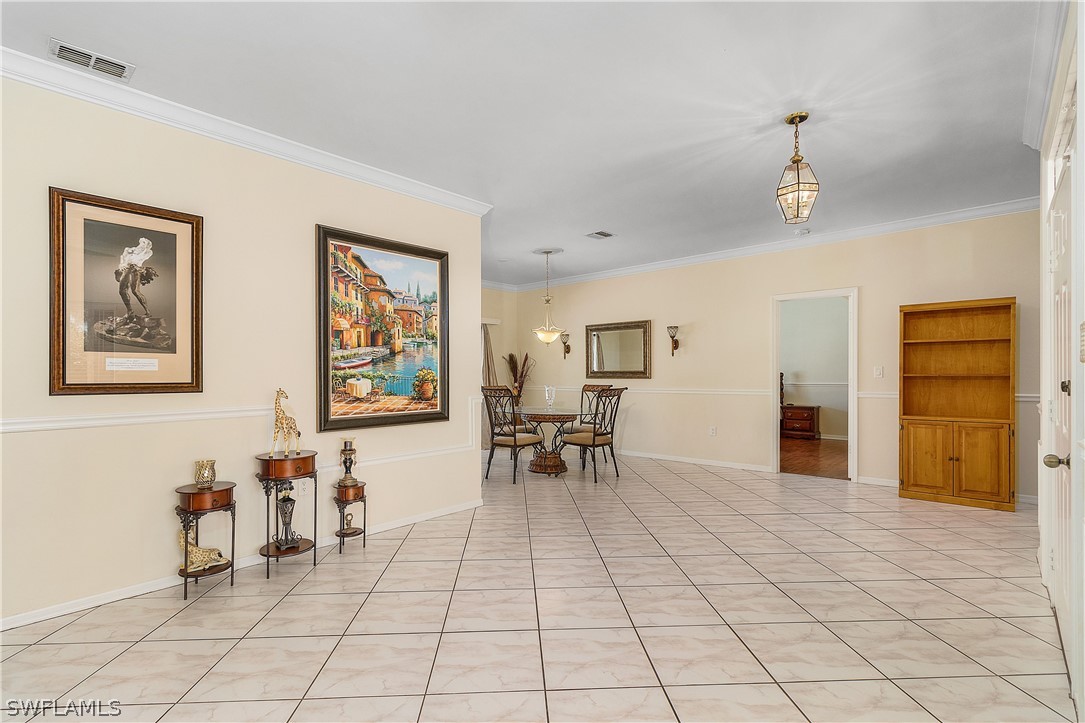 17601 Laurel Valley Road Fort Myers, FL 33967 - Photo 8 of 25 a living room with furniture and dining area