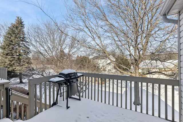 a view of a street with a large building
