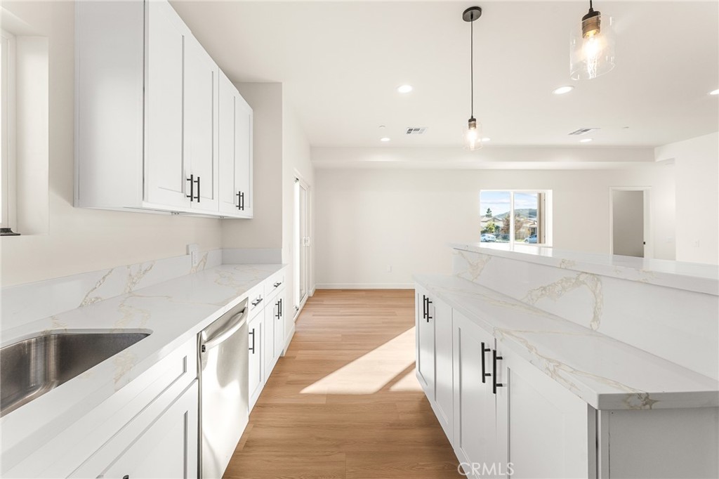 904 South Hert Street Colton, CA 92324 - Photo 17 of 35 a view of a kitchen with wooden floor