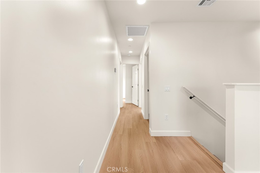 904 South Hert Street Colton, CA 92324 - Photo 21 of 35 a view of a hallway with wooden floor