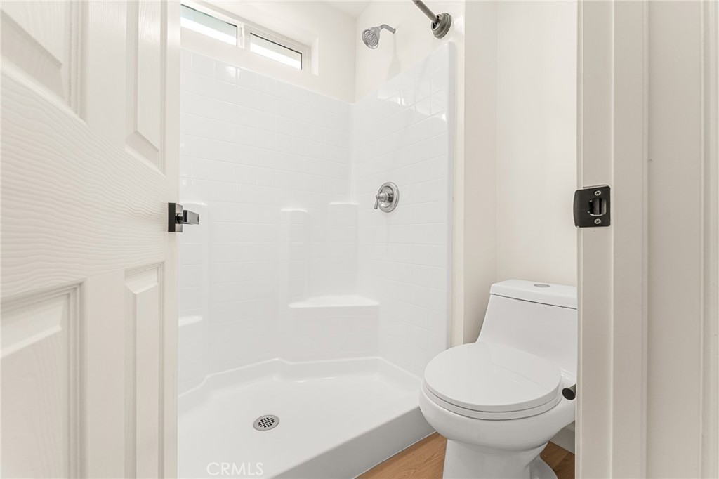 904 South Hert Street Colton, CA 92324 - Photo 26 of 35 a bathroom with a toilet and shower