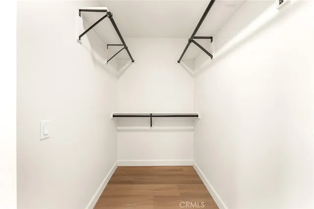 a view of storage and utility room with washer and dryer