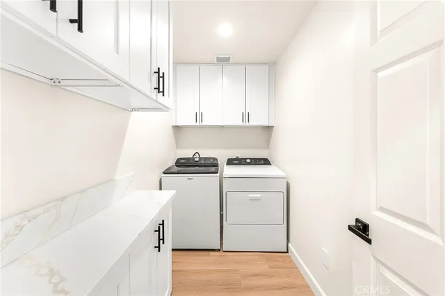 a bathroom with a shower sink and mirror
