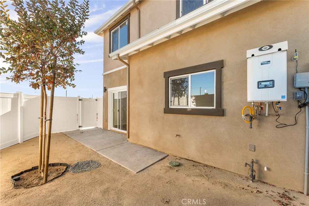 904 South Hert Street Colton, CA 92324 - Photo 34 of 35 a view of a house with a backyard