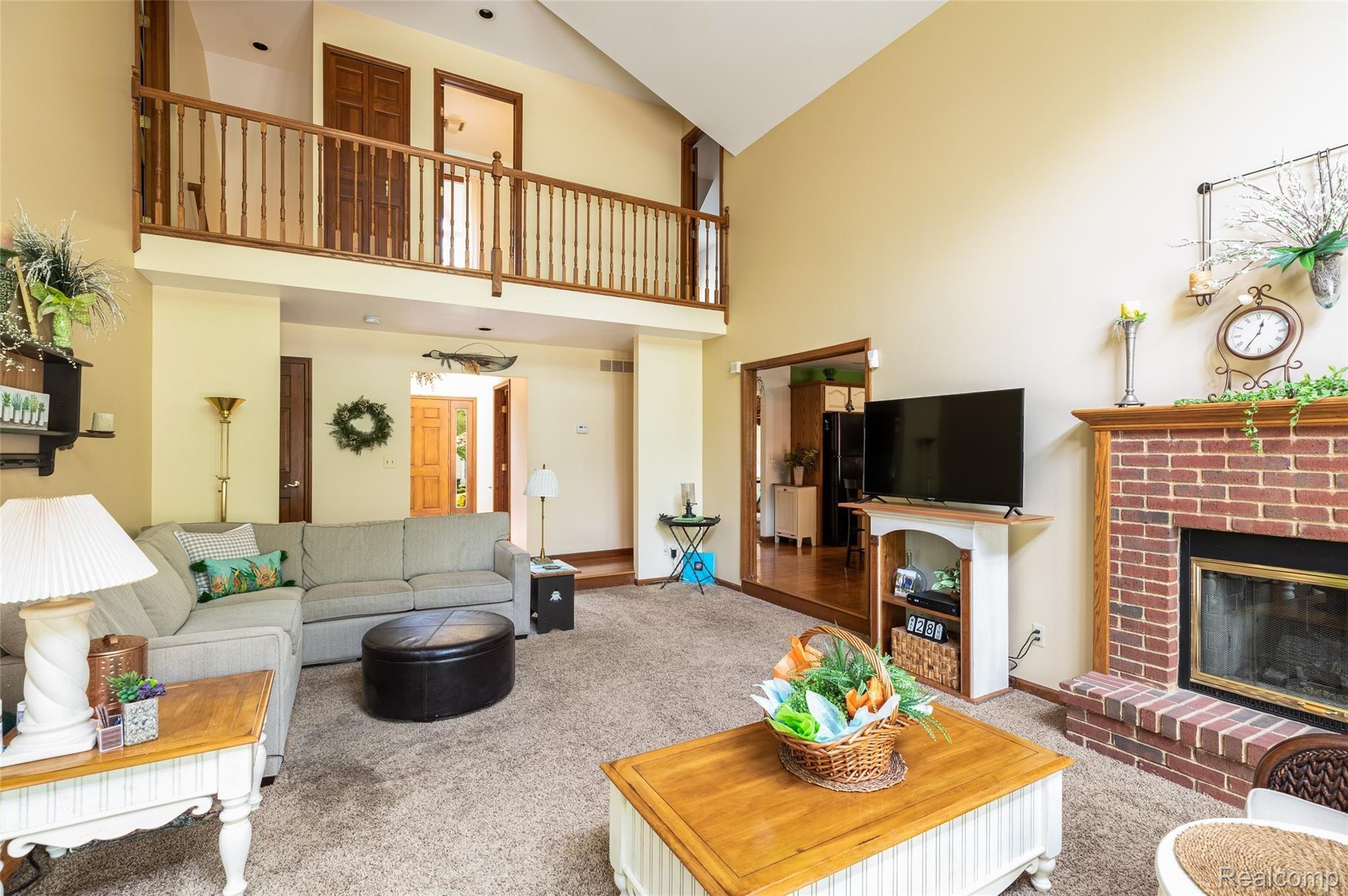 7751 Ridge Road Canton, MI 48187 - Photo 11 of 48 Vaulted Great Room with Gas Fireplace