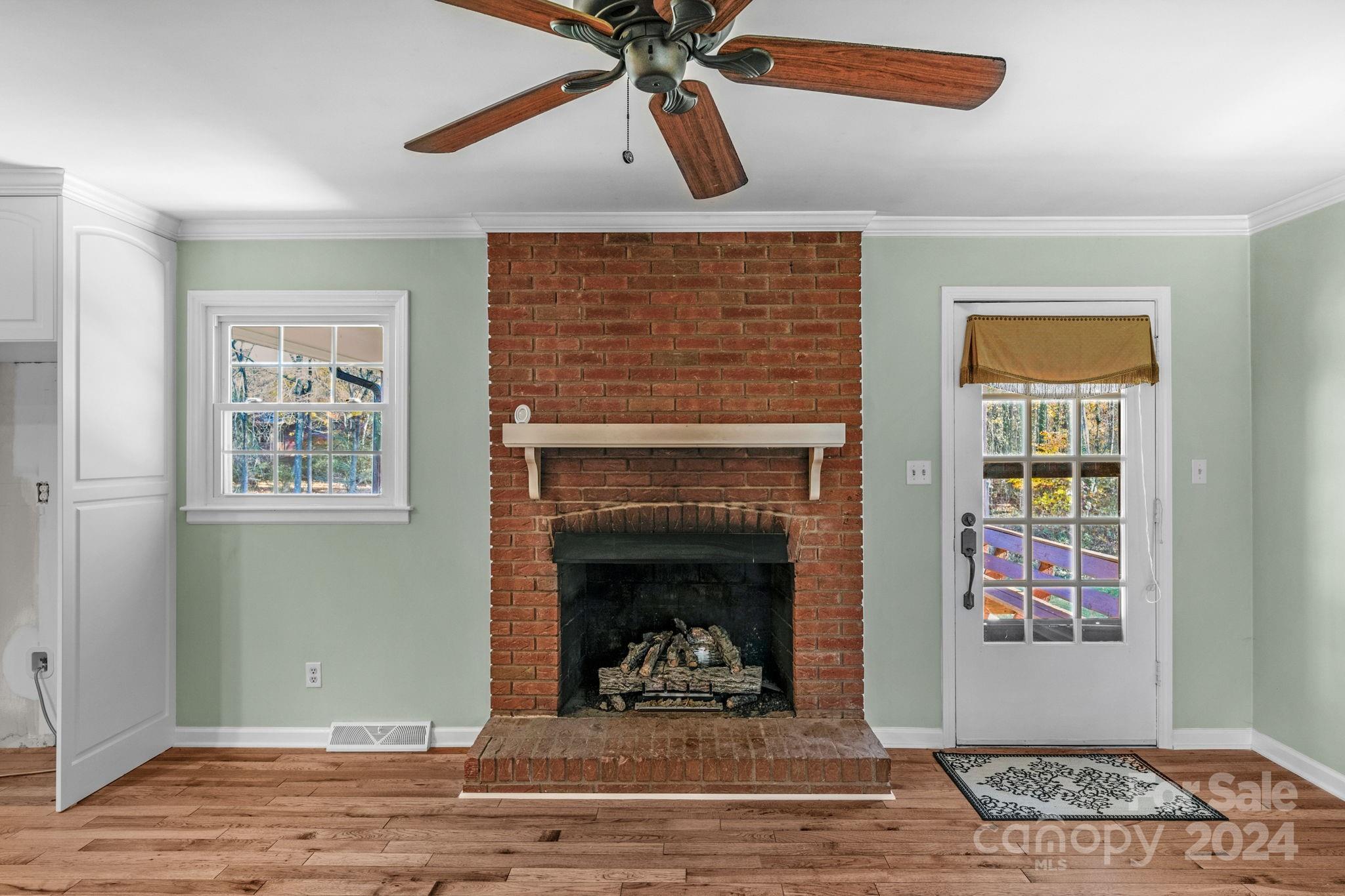 3704 Pinecrest Drive Gastonia, NC 28056 - Photo 22 of 48 a living room with furniture and a fireplace