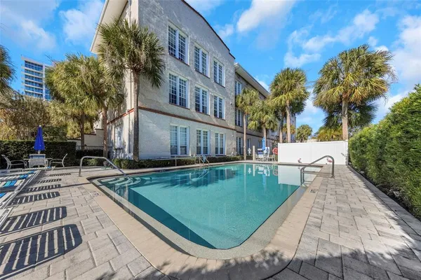 a view of a house with a swimming pool