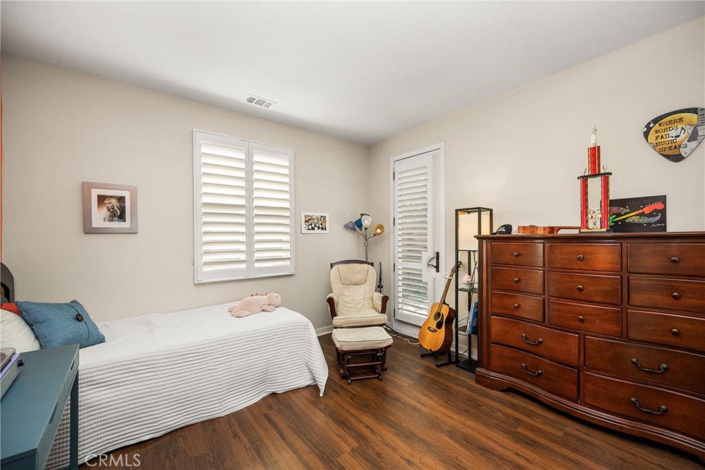 228 Borrego Irvine, CA 92618 - Photo 27 of 50 a bed room with a bed and a couch