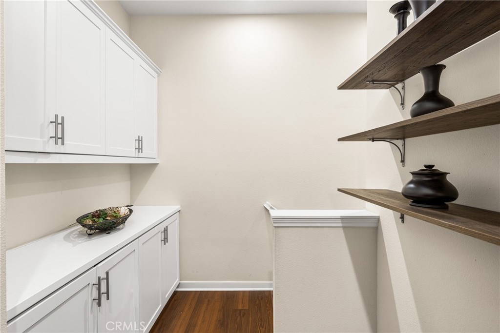 228 Borrego Irvine, CA 92618 - Photo 28 of 50 a kitchen with a sink and cabinets