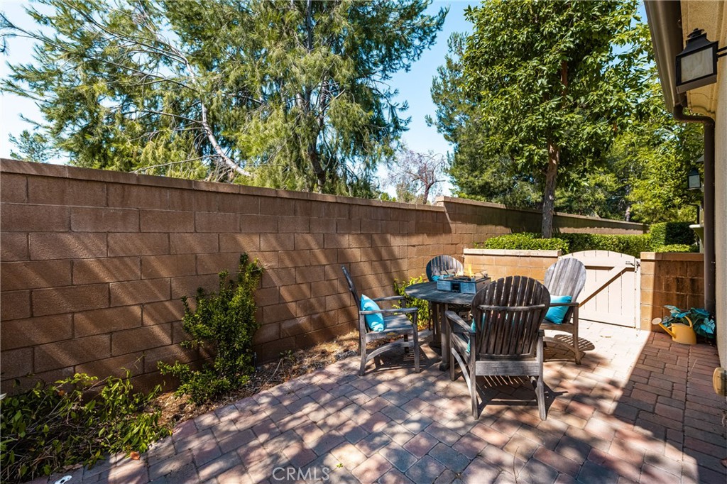 228 Borrego Irvine, CA 92618 - Photo 37 of 50 a view of a chairs and table in patio