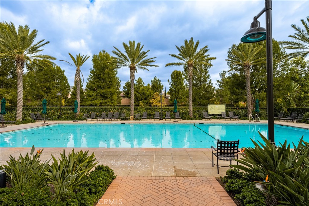 228 Borrego Irvine, CA 92618 - Photo 46 of 50 a view of a swimming pool with a patio and a yard