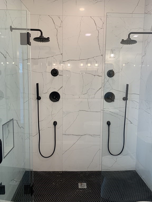 7 Sharon Avenue, Unit 7 Newton, MA 02466 - Photo 11 of 28 a bathroom with a shower