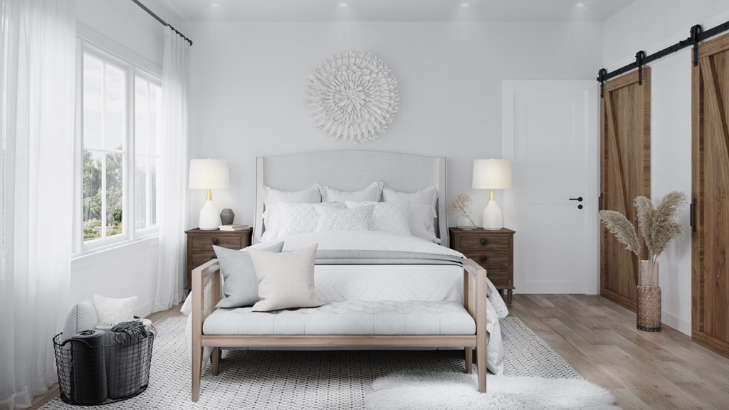 7 Sharon Avenue, Unit 7 Newton, MA 02466 - Photo 9 of 28 a bedroom with a bed and a window