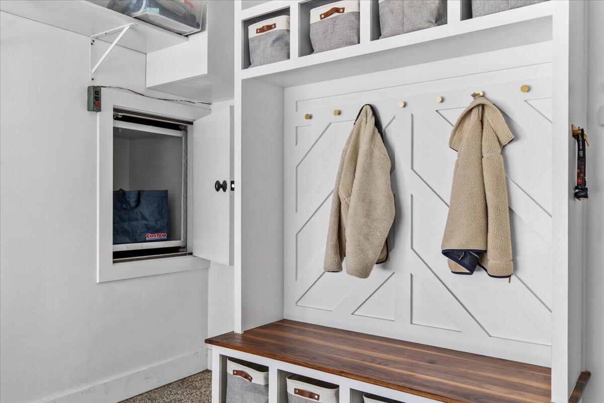 4763 Fontana Beach Road Polk, WI 53086 - Photo 26 of 61 Build in mudroom + Dumbwaiter (garage) - Strong enough for your Costco hauls!
