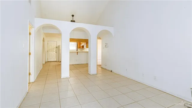 a view of a house with a yard and garage