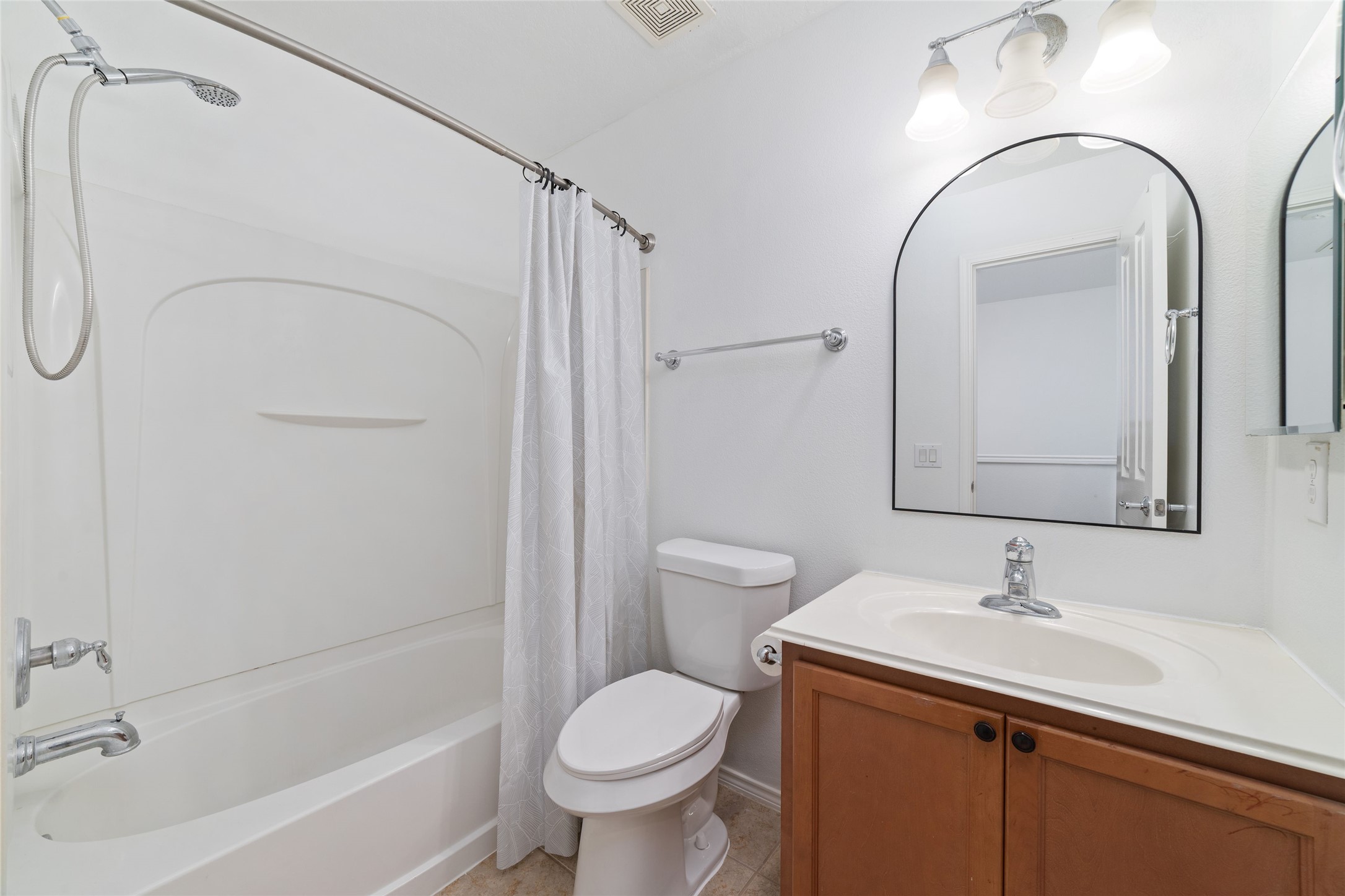 23602 Youpon Lake Lane Spring, TX 77373 - Photo 15 of 21 Full bathroom with clean design and functional layout.