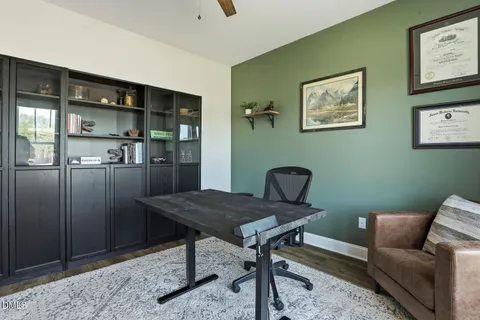 a view of a livingroom with furniture and window