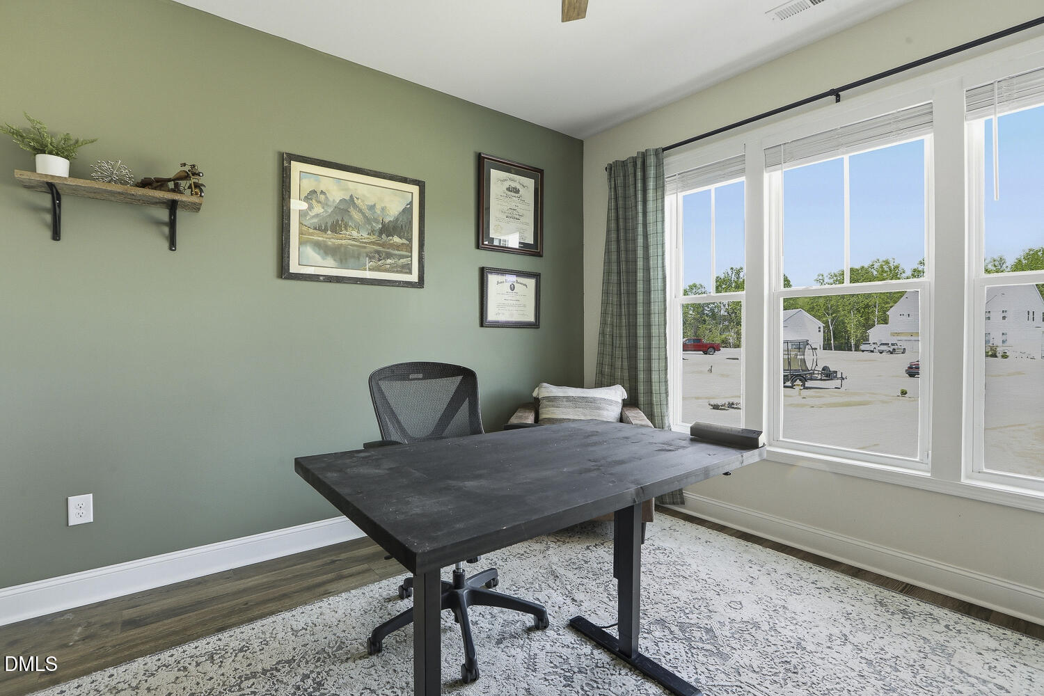 801 Oak Rose Lane Rolesville, NC 27571 - Photo 10 of 70 a view of a dining room with furniture window and outside view