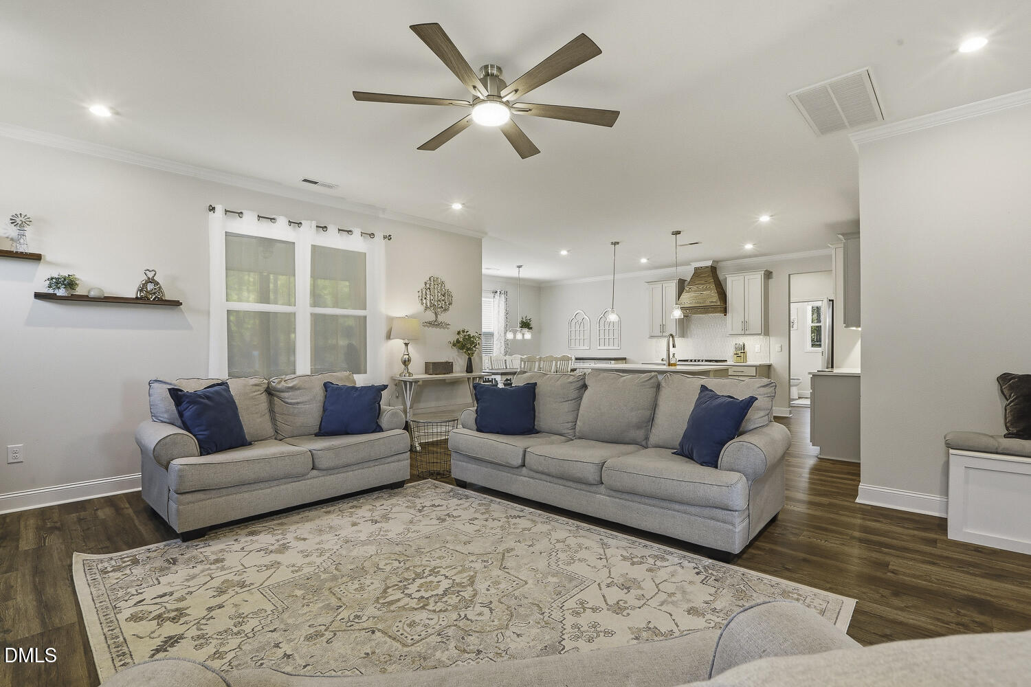 801 Oak Rose Lane Rolesville, NC 27571 - Photo 12 of 70 a living room with furniture and a view of kitchen