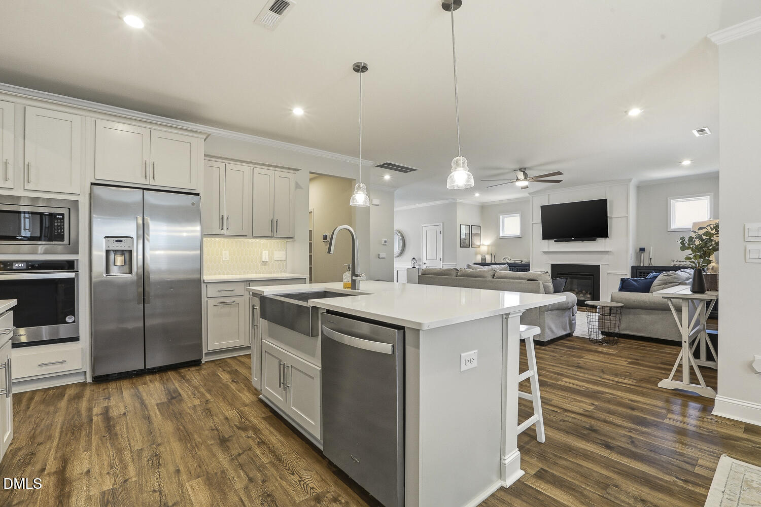 801 Oak Rose Lane Rolesville, NC 27571 - Photo 24 of 70 a kitchen with a sink stainless steel appliances and counter space