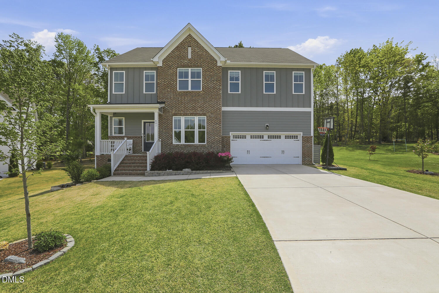 801 Oak Rose Lane Rolesville, NC 27571 - Photo 2 of 70 a front view of a house with a yard