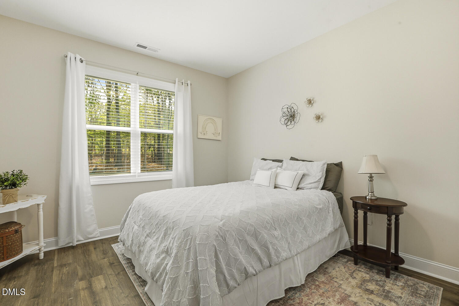 801 Oak Rose Lane Rolesville, NC 27571 - Photo 32 of 70 a bedroom with a bed and a window
