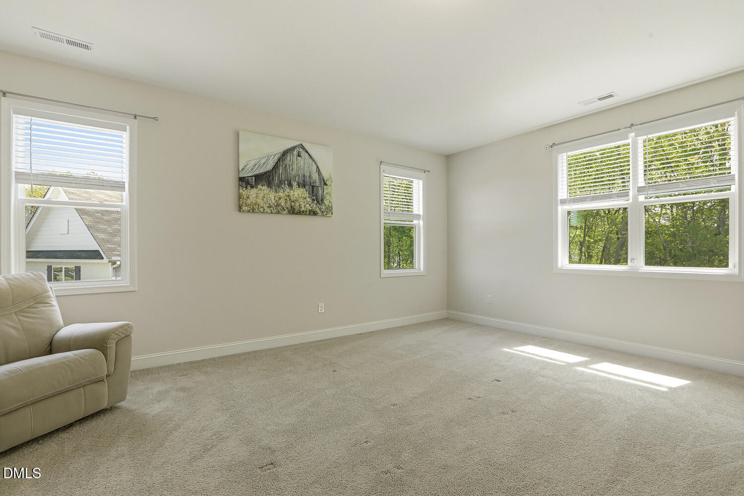 801 Oak Rose Lane Rolesville, NC 27571 - Photo 37 of 70 an empty room with windows and a ceiling fan