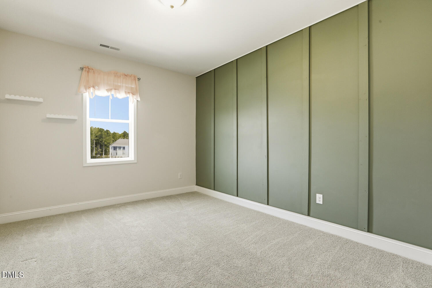 801 Oak Rose Lane Rolesville, NC 27571 - Photo 43 of 70 a view of an empty room with a window