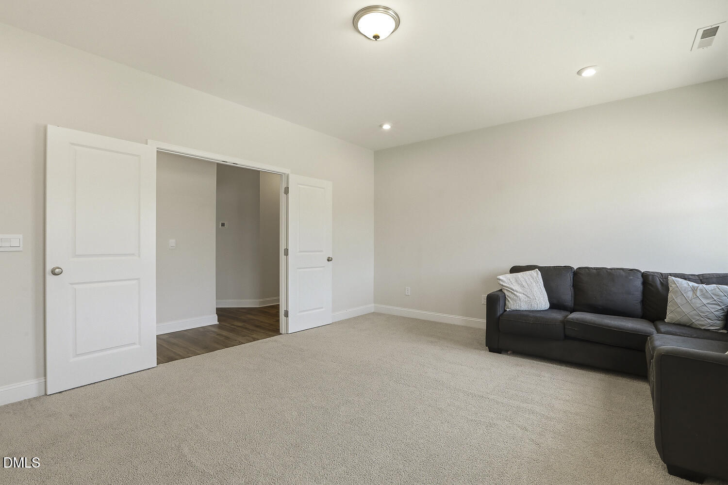 801 Oak Rose Lane Rolesville, NC 27571 - Photo 54 of 70 a living room with furniture and a couch