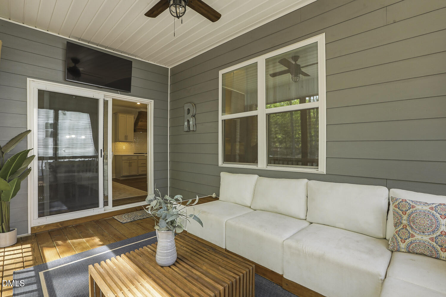 801 Oak Rose Lane Rolesville, NC 27571 - Photo 56 of 70 a view of a house with a large window and wooden floor
