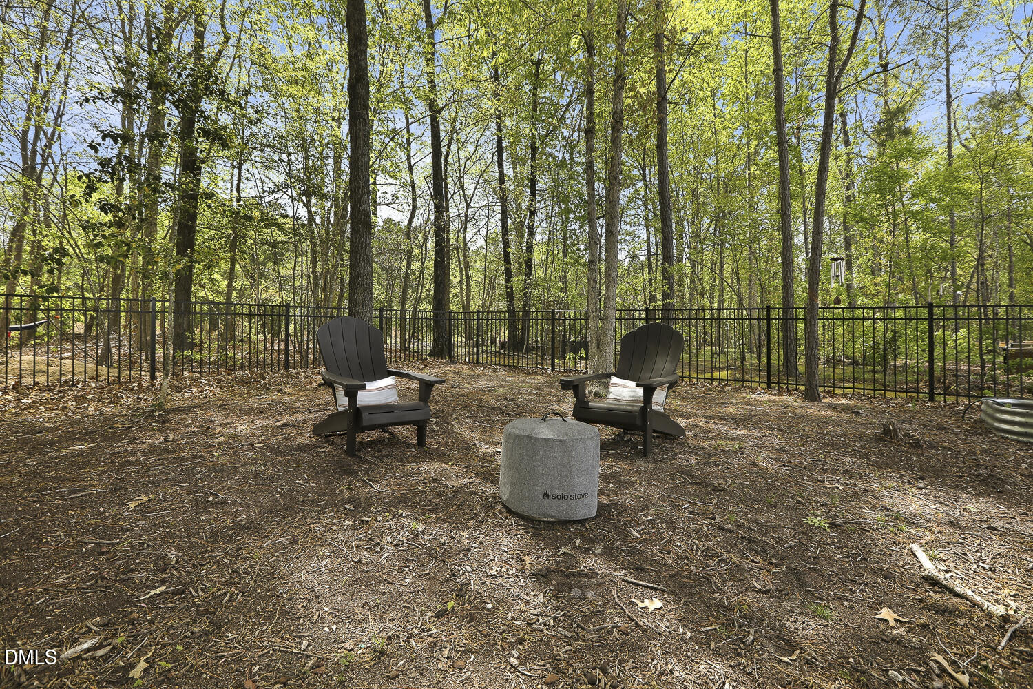 801 Oak Rose Lane Rolesville, NC 27571 - Photo 62 of 70 a view of a patio with table and chairs and potted plants