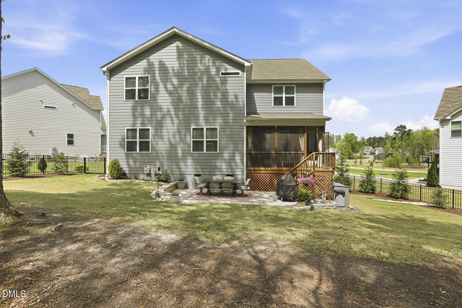 801 Oak Rose Lane Rolesville, NC 27571 - Photo 63 of 70 a view of a house with backyard and sitting area
