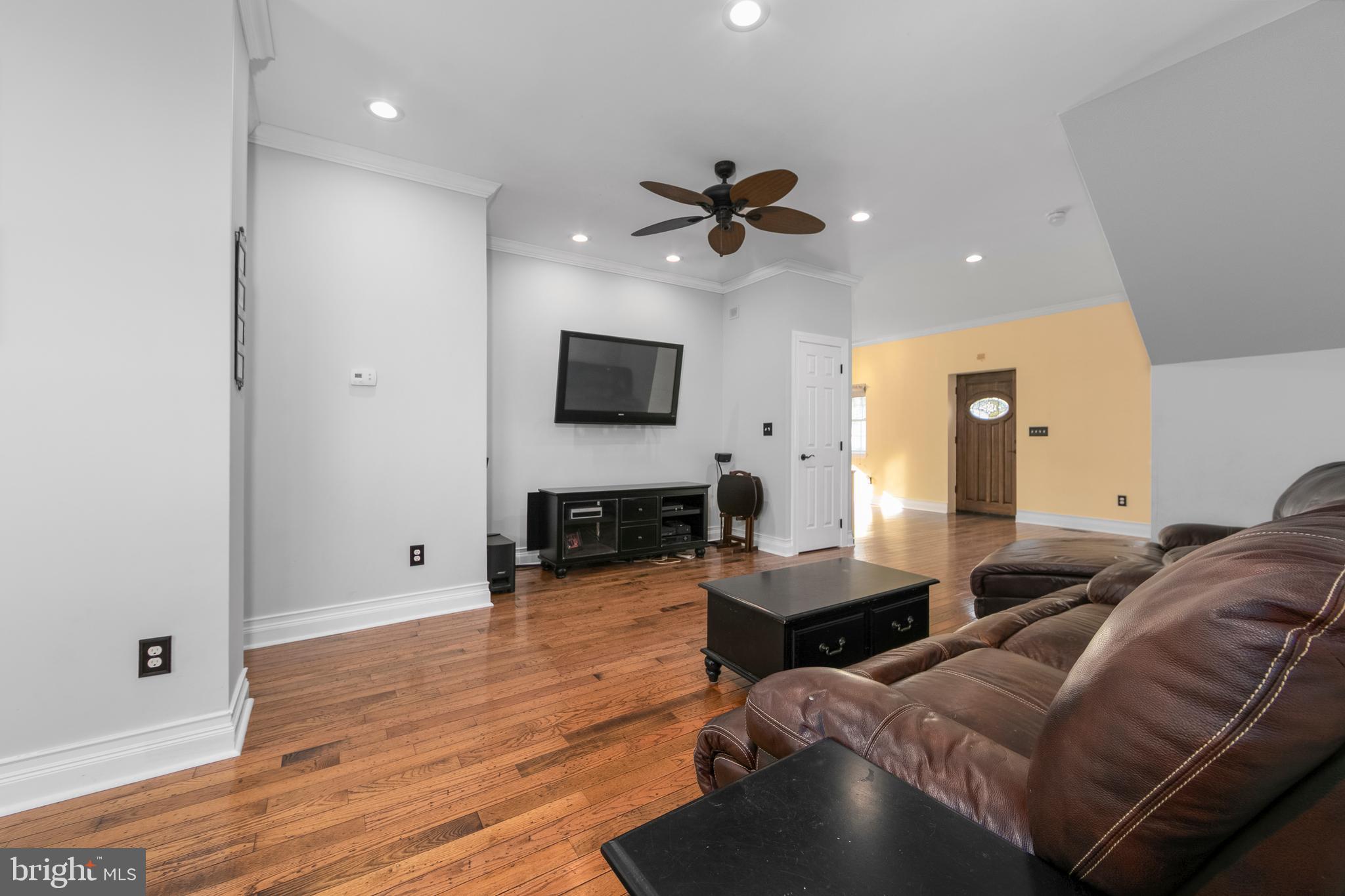 117 State Avenue Lindenwold, NJ 08021 - Photo 13 of 50 a living room with furniture and a flat screen tv