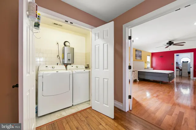 a bedroom with furniture and window