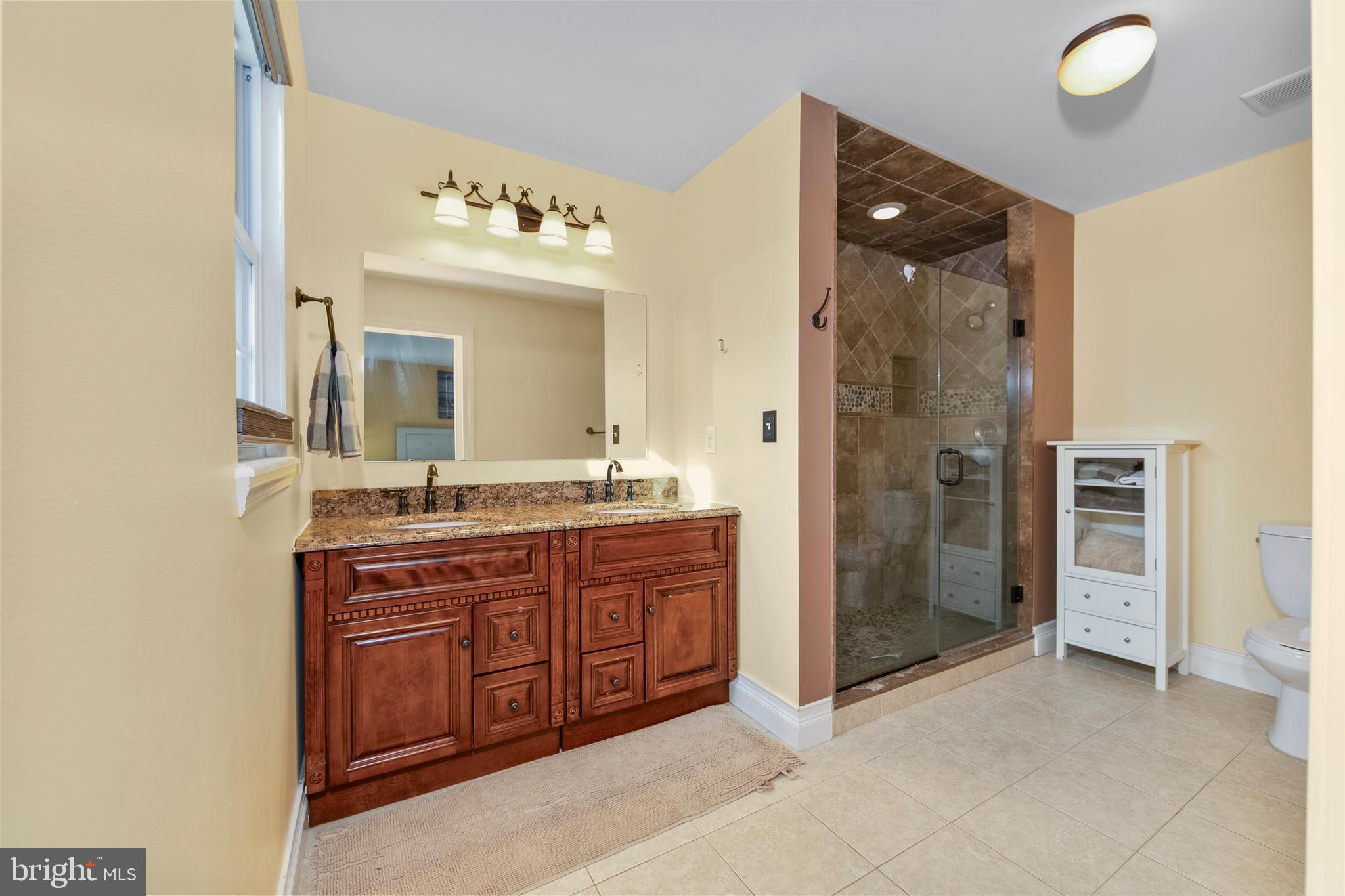 117 State Avenue Lindenwold, NJ 08021 - Photo 30 of 50 a spacious bathroom with a granite countertop sink mirror and shower