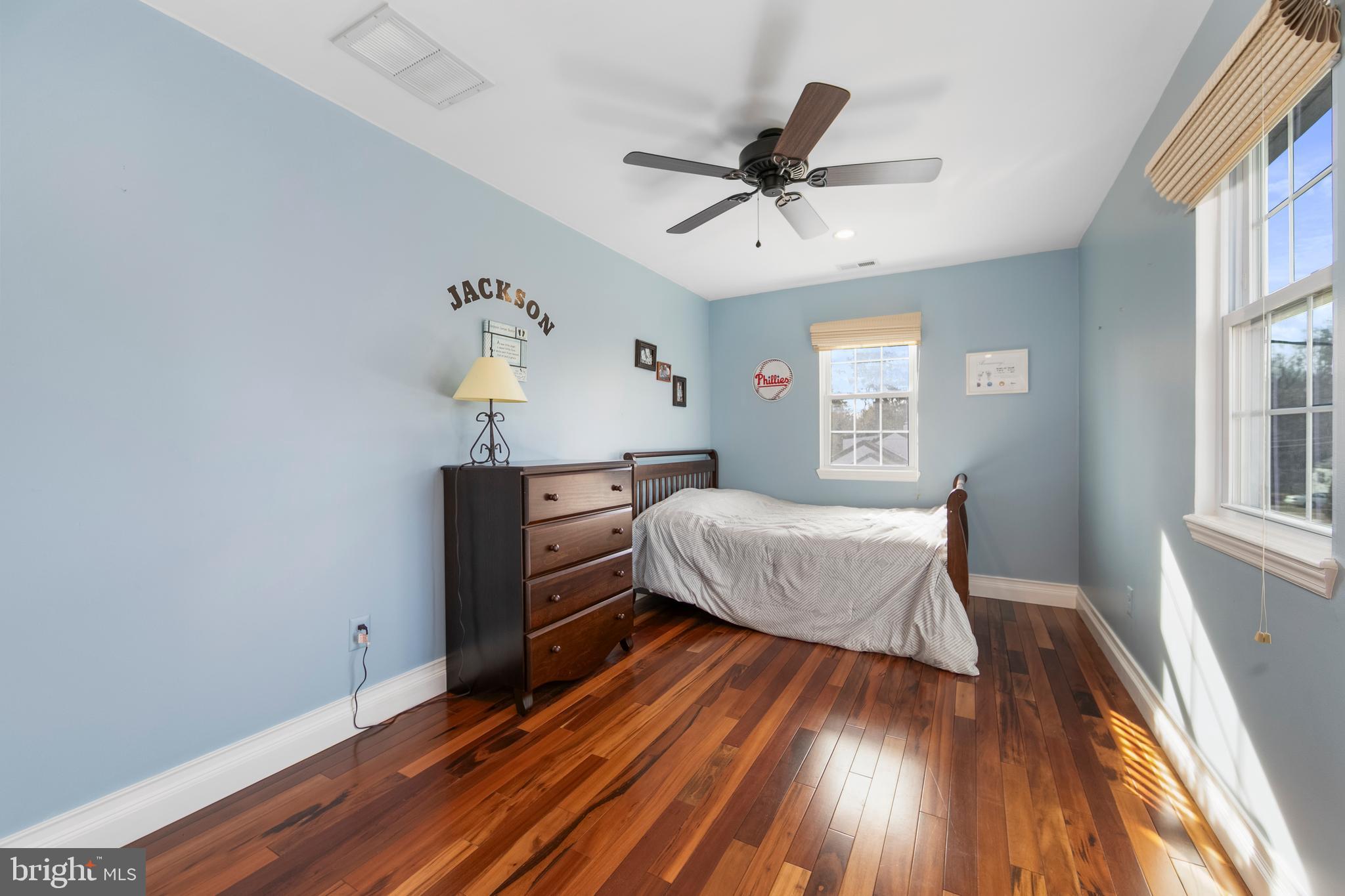 117 State Avenue Lindenwold, NJ 08021 - Photo 38 of 50 a bedroom with a bed and wooden floor
