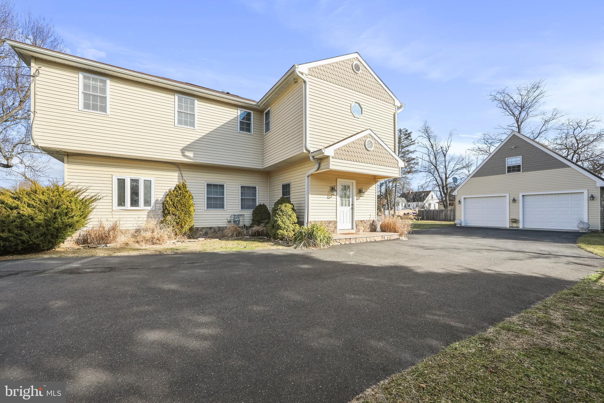 117 State Avenue Lindenwold, NJ 08021 - Photo 5 of 50 a front view of a house with a yard and garage