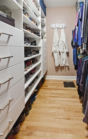 1425 Brummel Street Evanston, IL 60202 - Photo 12 of 24 a view of walk in closet with clothes and shoes