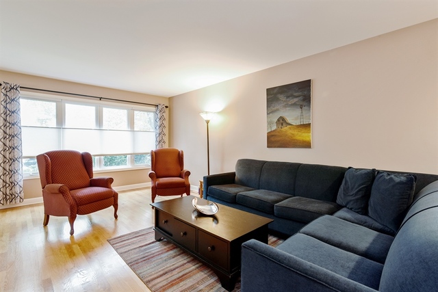 1425 Brummel Street Evanston, IL 60202 - Photo 3 of 24 a living room with furniture and a large window