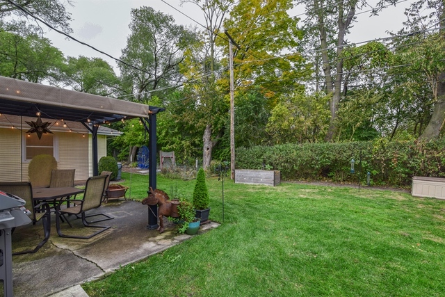 1425 Brummel Street Evanston, IL 60202 - Photo 22 of 24 a view of a chair and table in backyard of the house