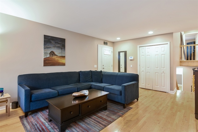 1425 Brummel Street Evanston, IL 60202 - Photo 4 of 24 a living room with furniture and a wooden floor
